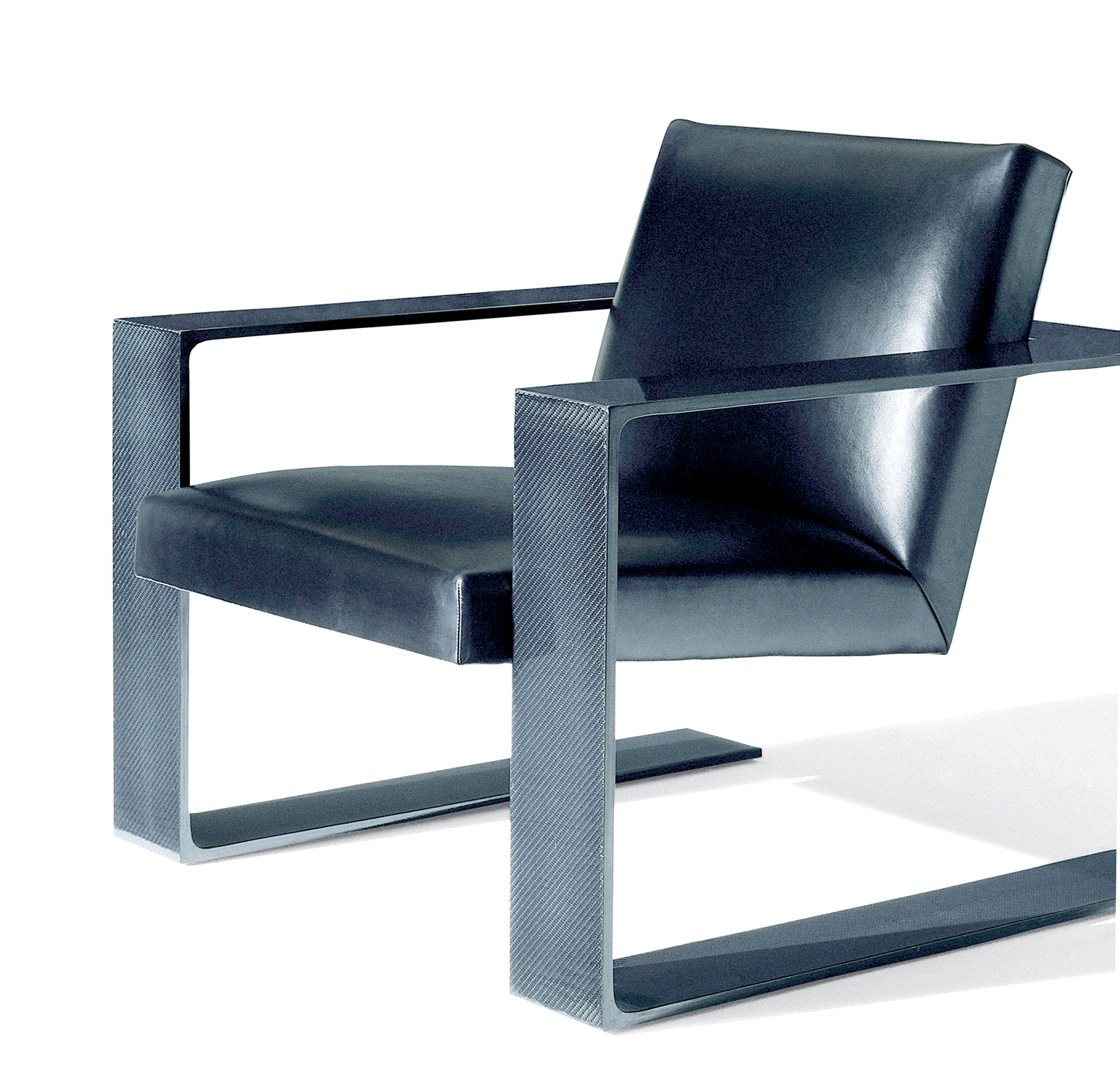  Formed from the same high-tech material that shapes Formula One race cars, the sleek RL-CF1 lounge chair boasts 54 layers of hand-laid tissue carbon
