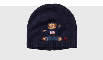 Knit beanie with Flag Bear at the front.