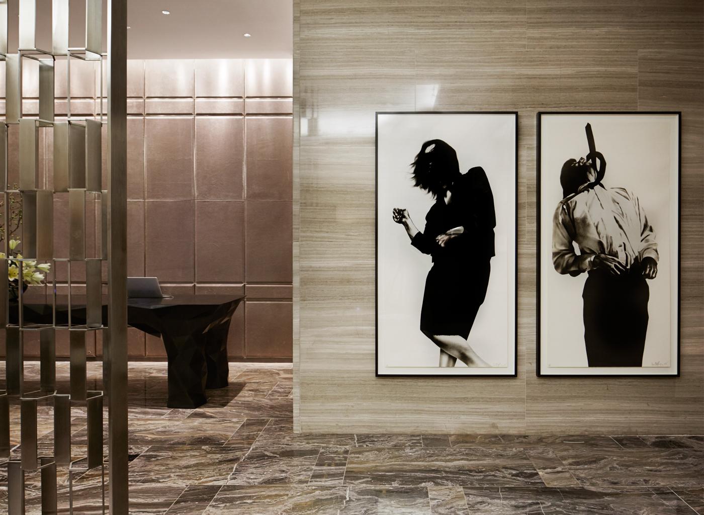                             Two works from Robert Longo&apos;s 1979 series &quot;Men in the Cities&quot; adorn a wall in the lobby of the Park Hyatt New York.