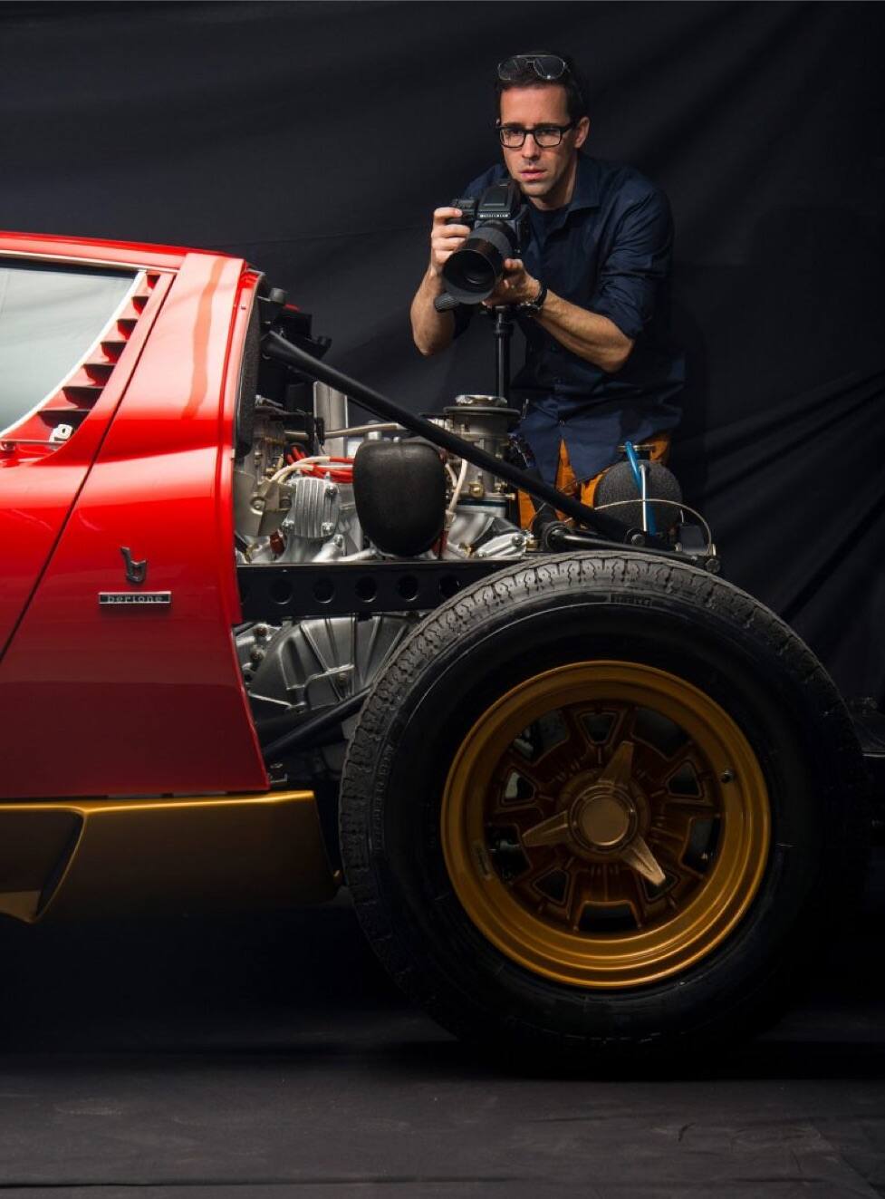 <strong>A Million Little Pieces</strong><br/><span>Oefner has photographed the component parts of a number of legendary cars, including, at top, a 1938 Bugatti Atlantic, and collaged them into images that make it appear as if the object is disintegrating </span>