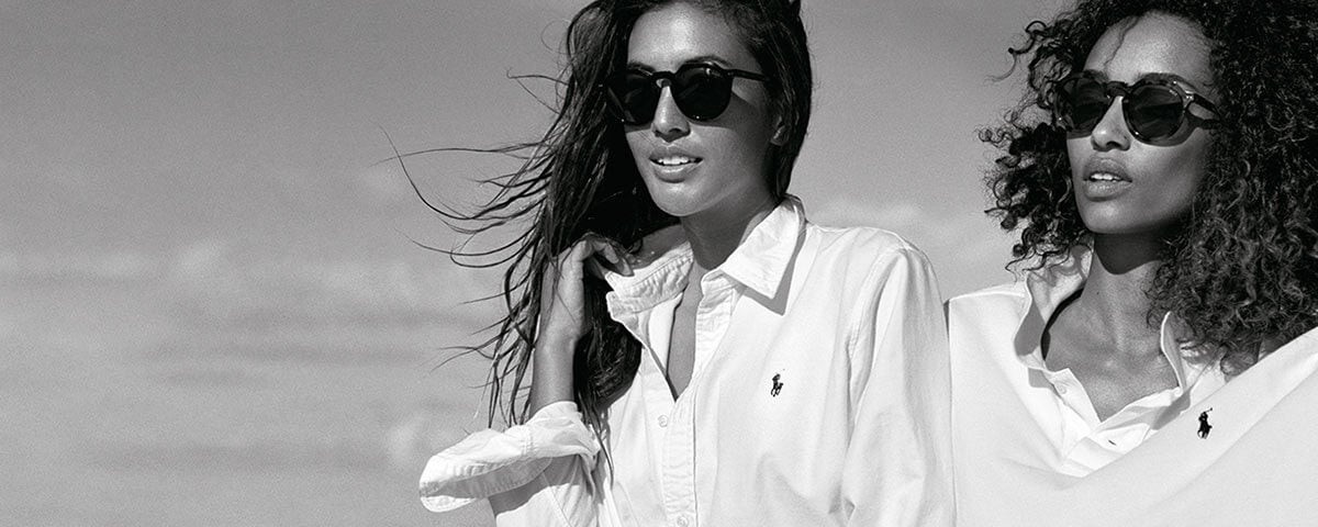 Photograph of two women wearing sunglasses
