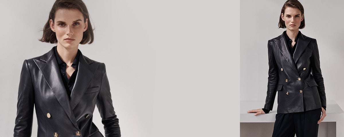 Woman in slim leather blazer with gold buttons