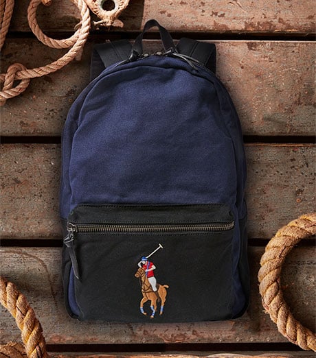 Navy backpack with embroidered Polo Pony at front zip pocket